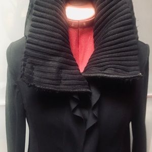 High collar one of a kind coat. Very soft fabric.